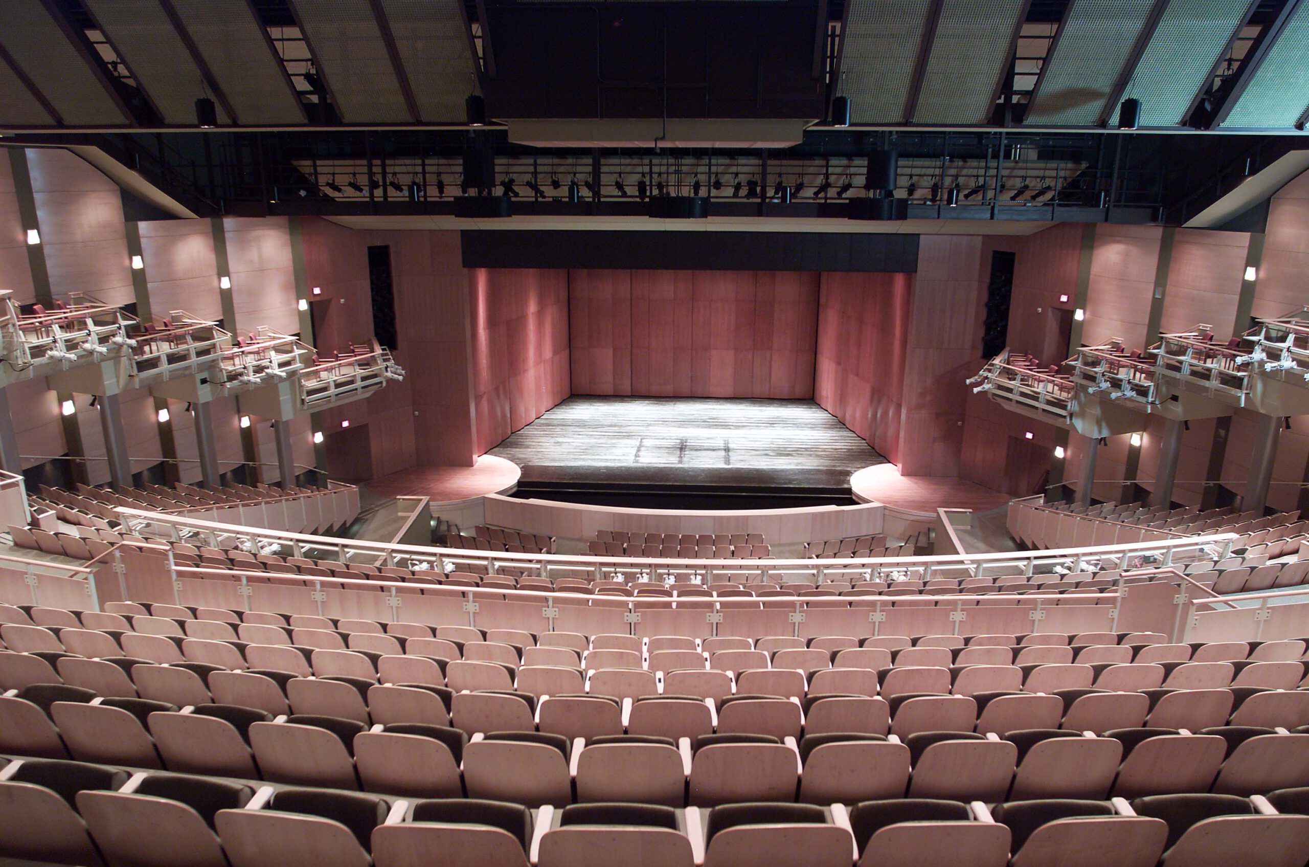 photo of the fine arts center auditorium stage and surrounding seating